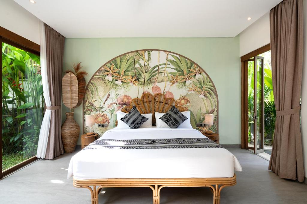 Tempat tidur dalam kamar di Villa Arroyo by BaliSuperHost