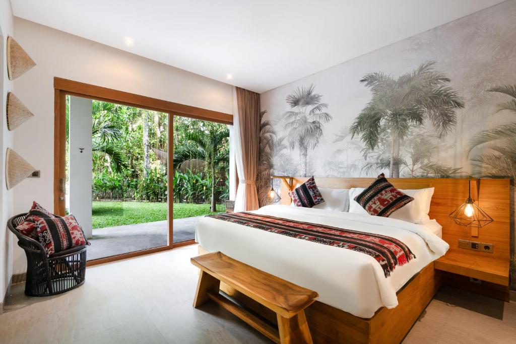 Tempat tidur dalam kamar di Villa Arroyo by BaliSuperHost