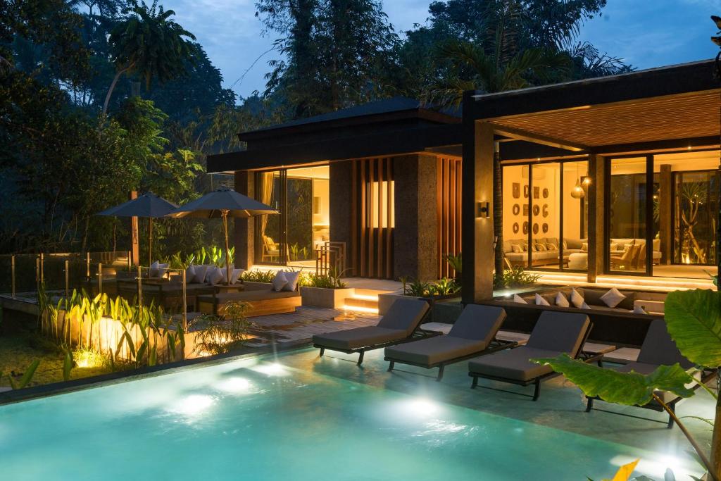 Kolam renang di atau di dekat Villa Kia Ora by BaliSuperHost