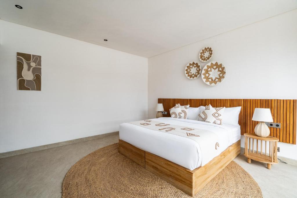 Tempat tidur dalam kamar di Asmara by BaliSuperHost