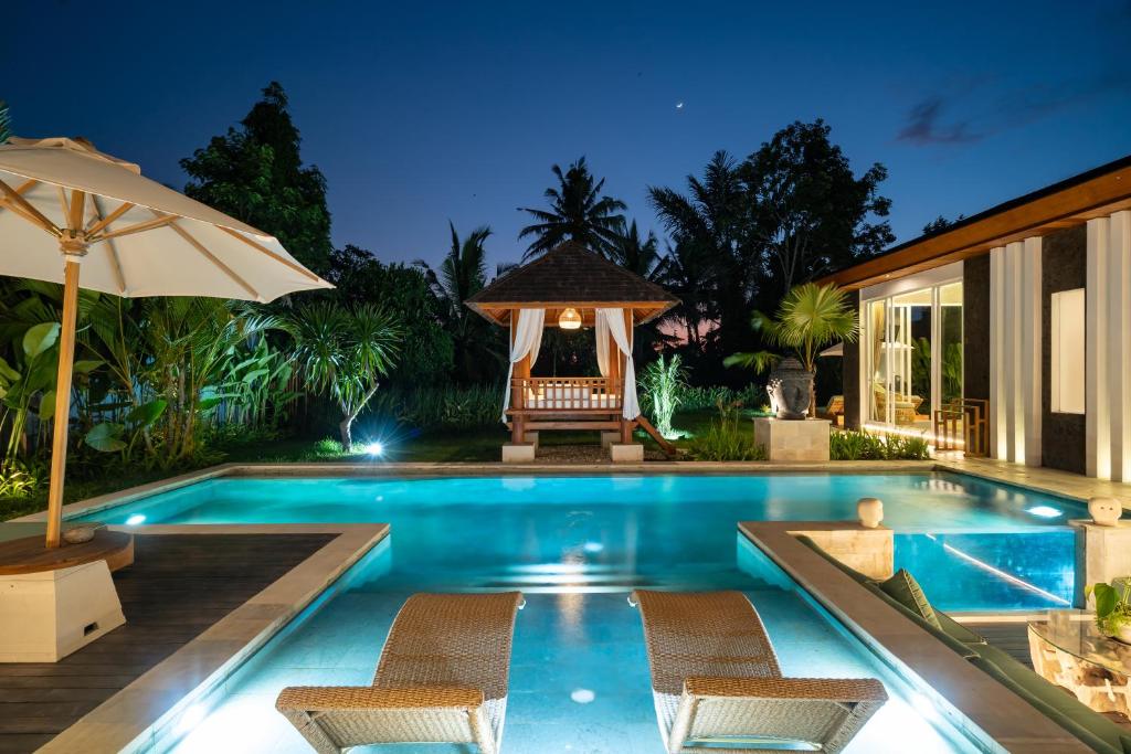 Kolam renang di atau di dekat Villa Myassa by BaliSuperHost