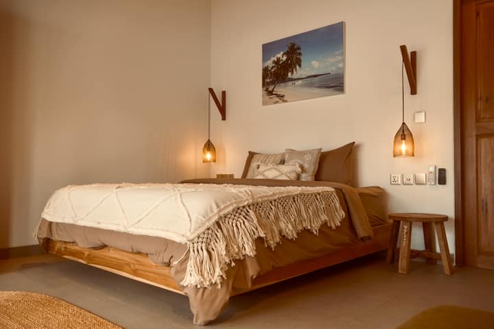 One of two bedrooms, equipped with a king sized bed.